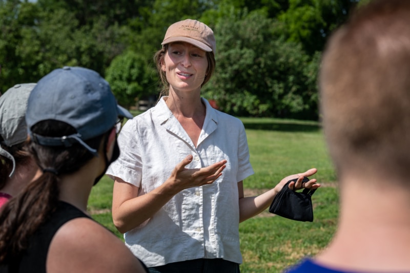 Anna Andersson, a civic science research technician, tells a visiting tour group about The Land Institute's work